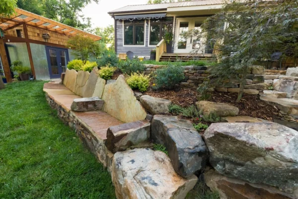 Outdoor hardscape with stone seating